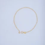 PULSO DE TEJIDO BANANA EN ORO 18K