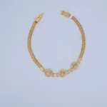 PULSO DE TEJIDO CHINO ÁRBOLES DE LA VIDA EN ORO 18K