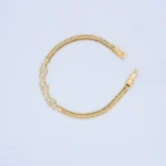 PULSO DE TEJIDO CHINO TRÉBOLES EN ORO 18K