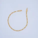 PULSO DE TEJIDO TRES POR UNO EN ORO 18K