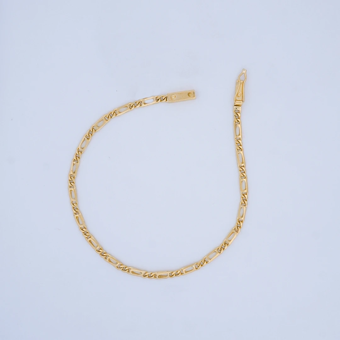 1572107.webp PULSO DE TEJIDO TRES POR UNO EN ORO 18K - Image 1