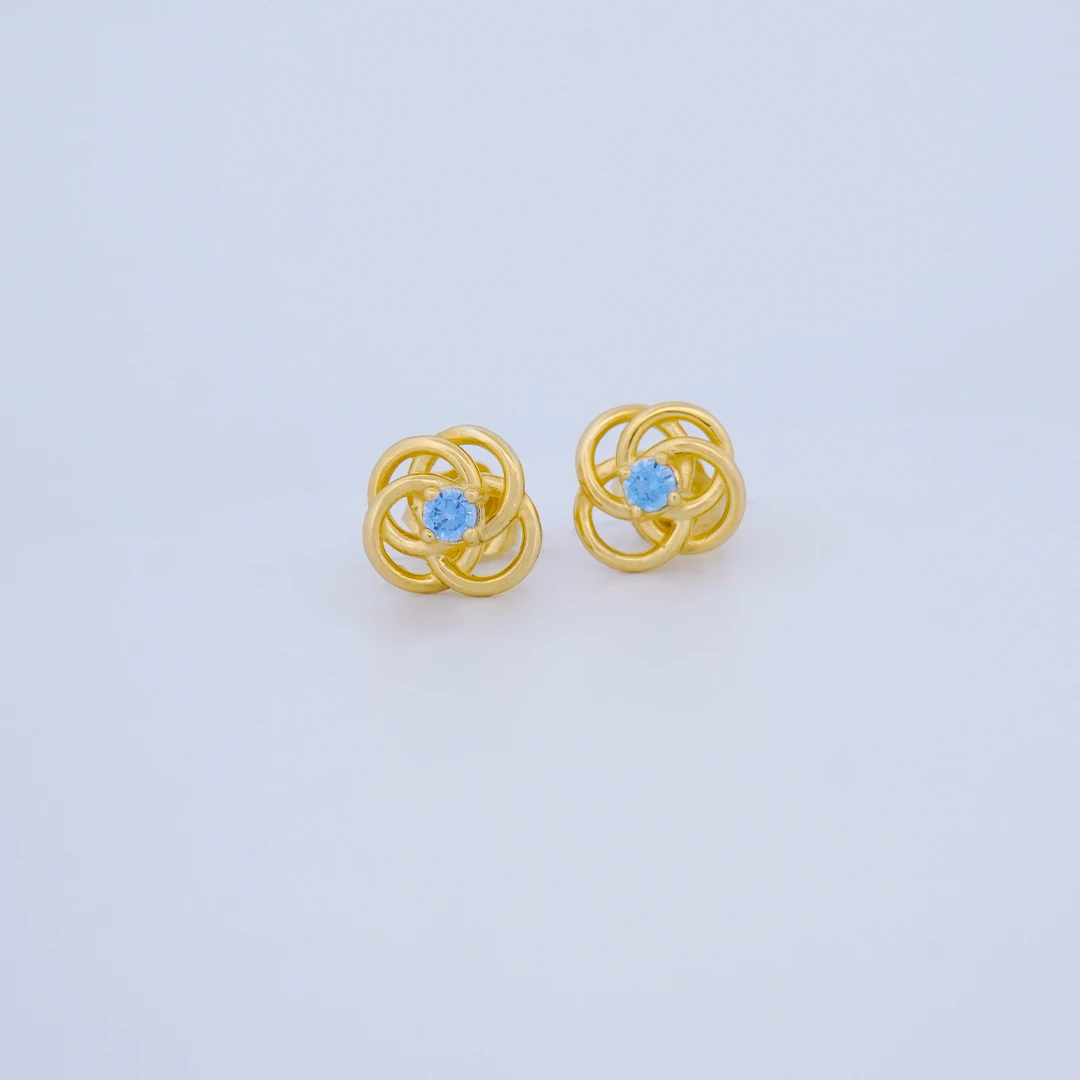 1634803.webp ARETES TOPOS FLOR CON PIEDRA AZUL EN ORO 18K - Image 1