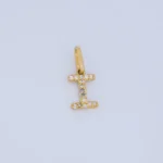 DIJE LETRA I CON PIEDRAS EN ORO 18K