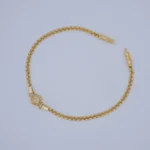 PULSO DE TEJIDO CHINO MEDIA BOLA EN ORO 18K