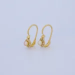 ARETES FLOR CON PERLA EN ORO 18K