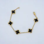 Pulsera Tejido Van Cleef Con Piedras Negras Oro 18K - Orofino Ecuador